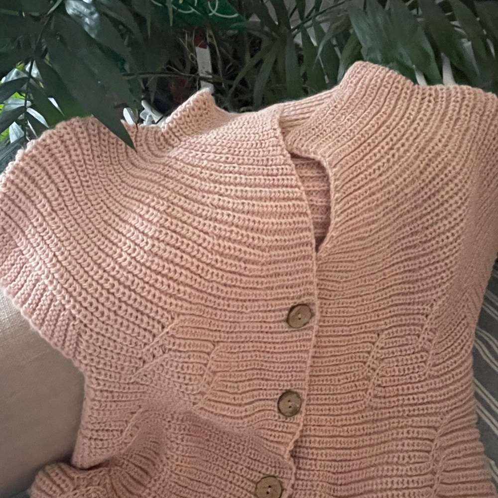 Pink sleeveless cardigan
